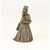 A bronze figural table bell of a gentleman