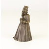 A bronze figural table bell of a gentleman