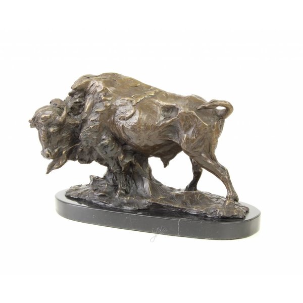  A bronze sculpture of a standing buffalo