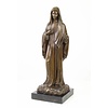 A large bronze sculpture of Madonna