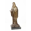 A large bronze sculpture of Madonna