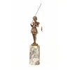 A bronze sculpture of a young girl fishing