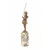 A bronze sculpture of a young girl fishing