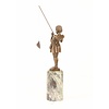 A bronze sculpture of a young girl fishing