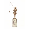 A bronze sculpture of a young girl fishing