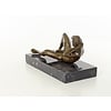 A bronze sculpture of a reclining male nude