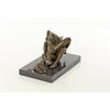 A bronze sculpture of a lesbian love scene