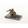 A bronze sculpture of a lesbian love scene