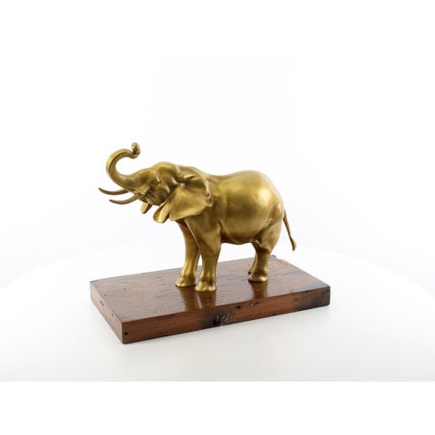 An Elephant on a wooden base