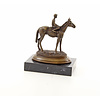 A bronze sculpture of a racehorse and jockey