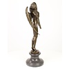 A bronze sculpture of the Winged Night