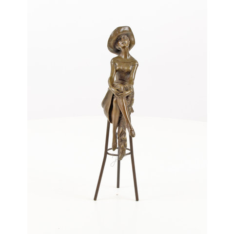 Lady with hat on barstool