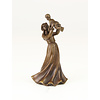 A bronze table bell of a female holding child