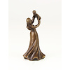 A bronze table bell of a female holding child