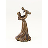 A bronze table bell of a female holding child
