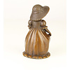 A bronze figural table bell of a young girl