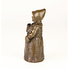 A bronze table bell of a drinking monk