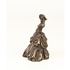 A bronze table bell of a lady with basket