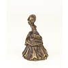 A bronze table bell of a lady with basket