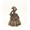 A bronze table bell of a lady with basket