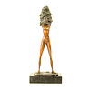 A bronze sculpture of an undressing female