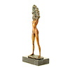 A bronze sculpture of an undressing female