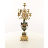 A pair of marble mounted gilded bronze candelabra's