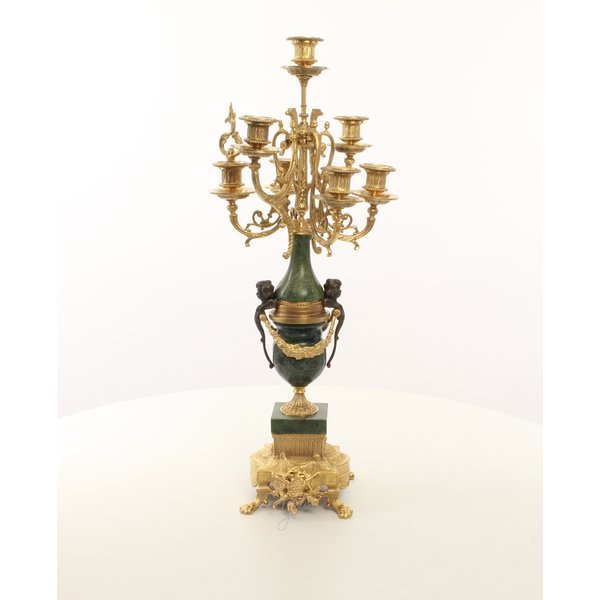  A pair of marble mounted gilded bronze candelabra's