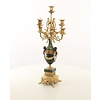 A pair of marble mounted gilded bronze candelabra's