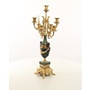 A pair of marble mounted gilded bronze candelabra's