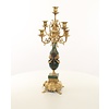 A pair of marble mounted gilded bronze candelabra's