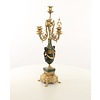 A pair of marble mounted gilded bronze candelabra's