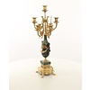 A pair of marble mounted gilded bronze candelabra's