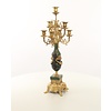 A pair of marble mounted gilded bronze candelabra's