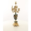 A pair of marble mounted gilded bronze candelabra's