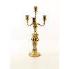 A four armed gilt bronze candelabra set