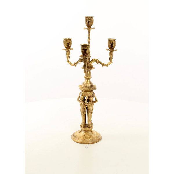  A four armed gilt bronze candelabra set