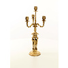 A four armed gilt bronze candelabra set