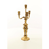 A four armed gilt bronze candelabra set