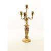 A four armed gilt bronze candelabra set