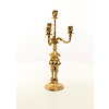 A four armed gilt bronze candelabra set