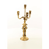 A four armed gilt bronze candelabra set