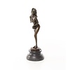 An erotic bronze sculpture of a standing female nude