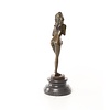 An erotic bronze sculpture of a standing female nude