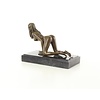 An erotic bronze sculpture of a kneeling nude female