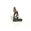 An erotic bronze sculpture of a kneeling nude female