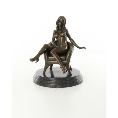 A seated female nude