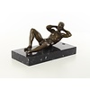 An erotic bronze sculpture of a reclining male nude