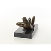 An erotic bronze sculpture of a reclining male nude