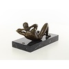 An erotic bronze sculpture of a reclining male nude